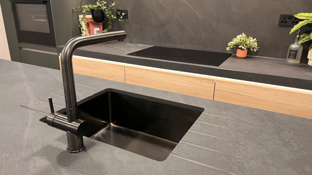 Industrial style kitchen with grey quartz countertops