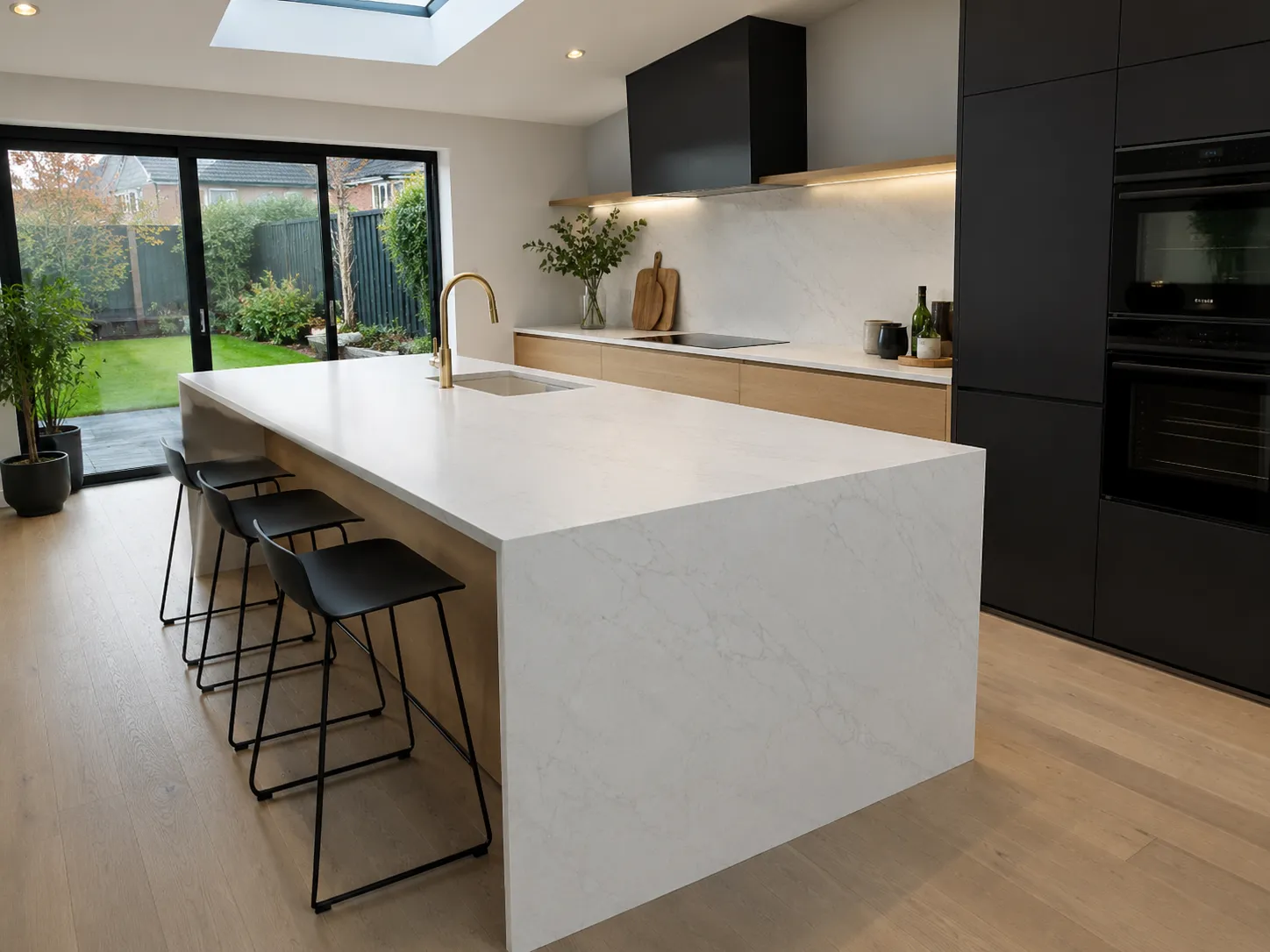 Bright modern kitchen with pure white quartz island